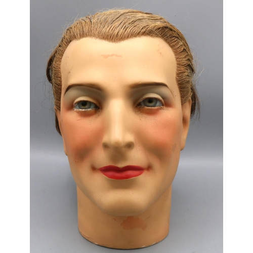 194 - Early C20th male plaster mannequin head, with real hair, glass eyes and painted face, c1930s, H26cm