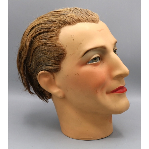 194 - Early C20th male plaster mannequin head, with real hair, glass eyes and painted face, c1930s, H26cm