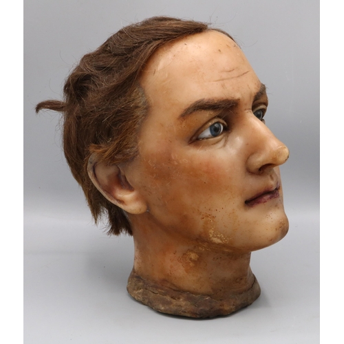 195 - Early C20th male wax mannequin head, with real hair, glass eyes and painted face, c1930s, H25cm