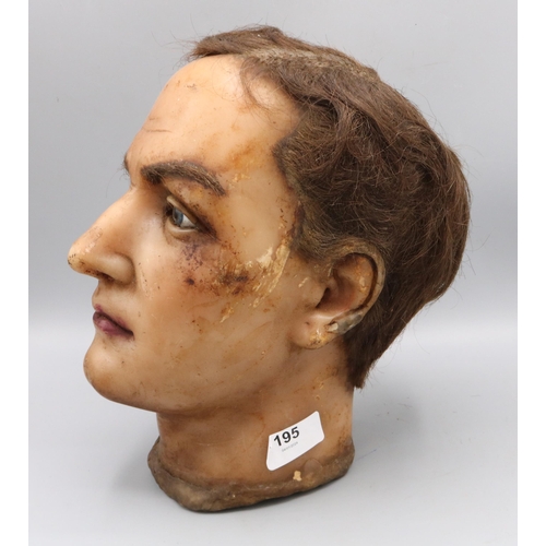 195 - Early C20th male wax mannequin head, with real hair, glass eyes and painted face, c1930s, H25cm