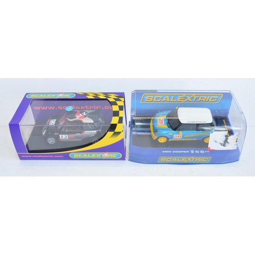 197 - Eight 1/32 scale racing slot cars to include 4x Scalextric Mini Coopers (C3073, C2992, C2911 Nixon A... 