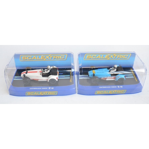 198 - Three Scalextric 1/32 scale Caterham slot racing cars to include C3133 Blue, C3309 R600 Jon Barnes 2... 