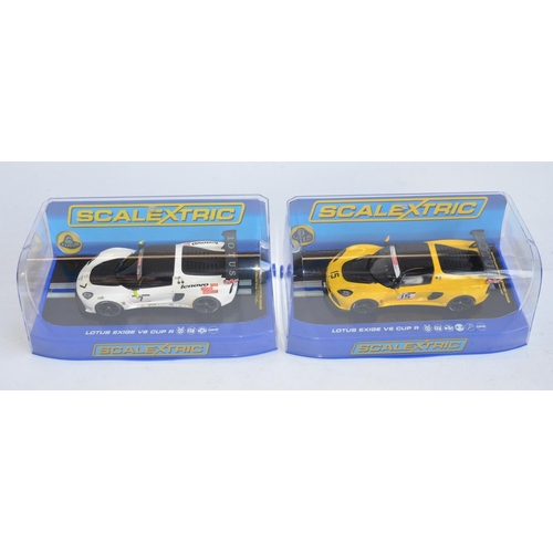 205 - Six 1/32 scale Scalextric racing slot car models to include 4x Lotus Exige, C3509 V6 Cup R Orange, C... 