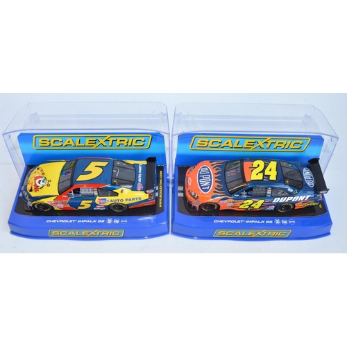 209 - Three 1/32 scale Scalextric racing slot car Nascar Chevrolet Impala SS models to include C2892 Casy ... 