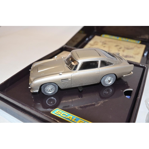 214 - Scalextric full 3 car James Bond Aston Martin DB5 slot car limited edition models to include C3091A ... 