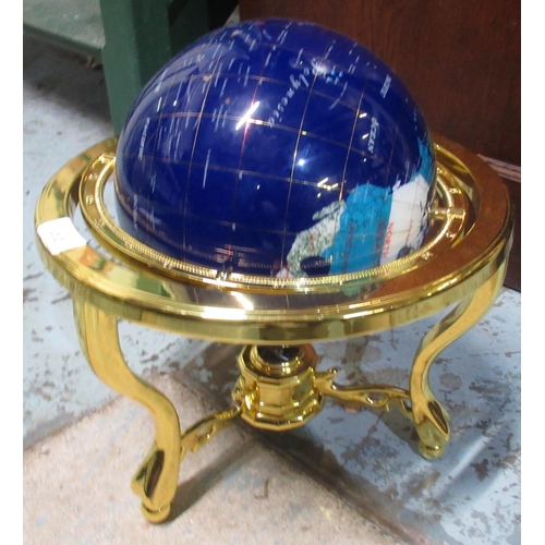 412 - Table top globe set with semi precious stones, on brass stand with inset compass, H34cm