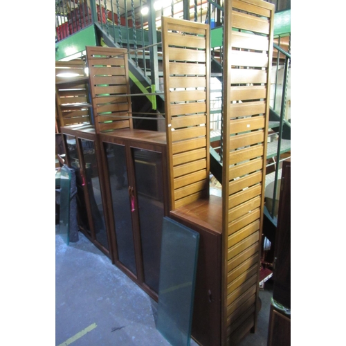 709 - Mid-century Staples Ladderax modular shelving system comprising; fall front cupboard, two twin glaze... 