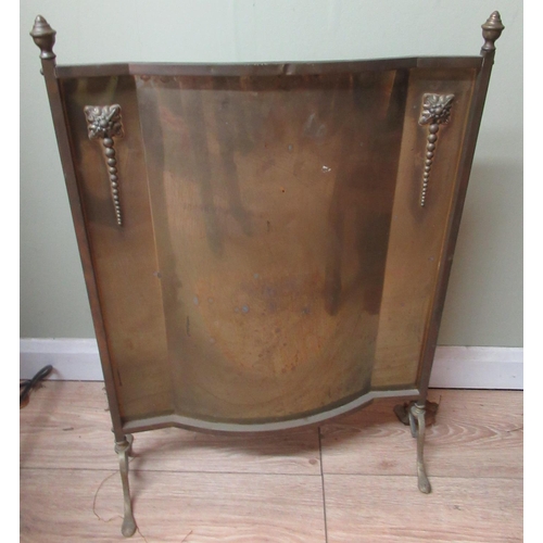 726 - WITHDRAWN C20th brass serpentine fire screen, with urn finials and on pad feet, W51cm H70cm