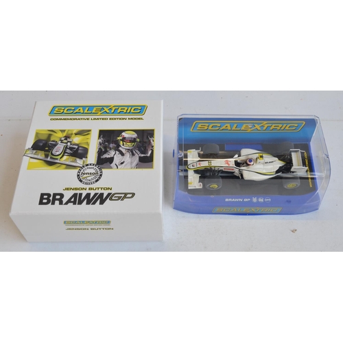 220 - Two Scalextric 1/32 scale Brawn GP Formula 1 racing slot cars to include Commemorative limited editi... 