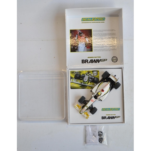 220 - Two Scalextric 1/32 scale Brawn GP Formula 1 racing slot cars to include Commemorative limited editi... 