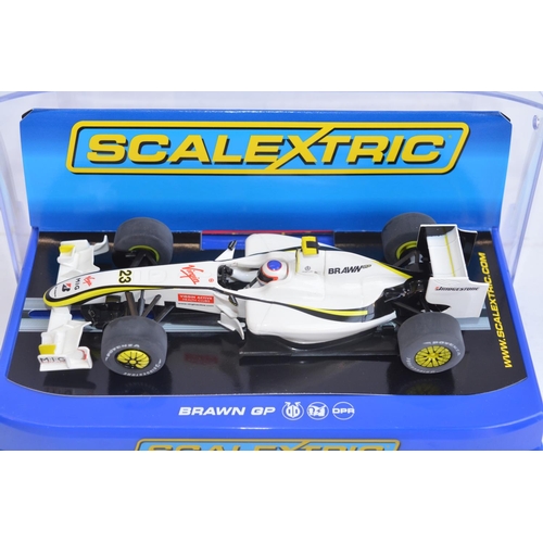 220 - Two Scalextric 1/32 scale Brawn GP Formula 1 racing slot cars to include Commemorative limited editi... 