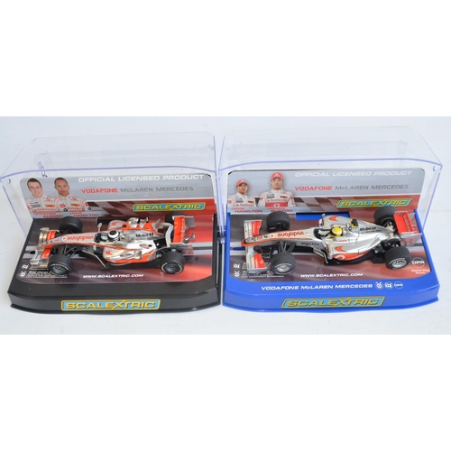 222 - Five Scalextric 1/32 scale McLaren Mercedes Formula 1 racing slot car models to include C2806 F.Alon... 