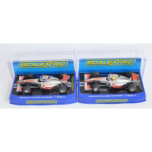 222 - Five Scalextric 1/32 scale McLaren Mercedes Formula 1 racing slot car models to include C2806 F.Alon... 