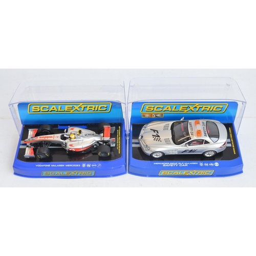 222 - Five Scalextric 1/32 scale McLaren Mercedes Formula 1 racing slot car models to include C2806 F.Alon... 