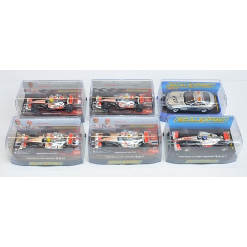 223 - Five Scalextric 1/32 scale McLaren Mercedes Formula 1 racing slot car models to include C2985 Lewis ... 