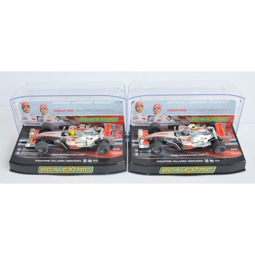 223 - Five Scalextric 1/32 scale McLaren Mercedes Formula 1 racing slot car models to include C2985 Lewis ... 