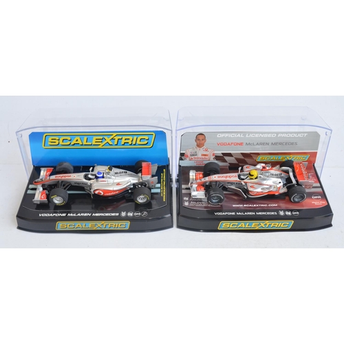 223 - Five Scalextric 1/32 scale McLaren Mercedes Formula 1 racing slot car models to include C2985 Lewis ... 