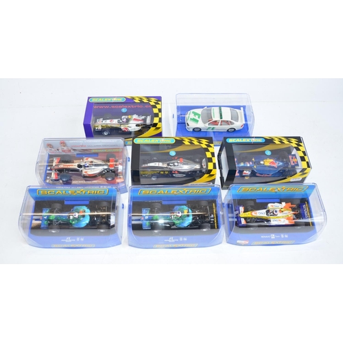 Seven Scalextric 1 32 scale Formula 1 Indy racing slot car models to include CC2817 Honda F1 No7 C2