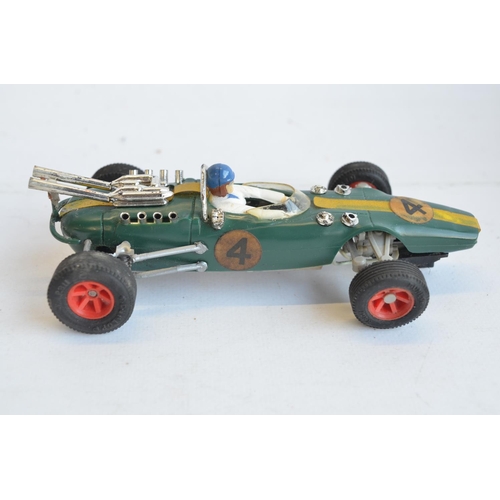 227 - Eight vintage slot racing cars to include Scalextric C129 Green March Ford 240, C426 F1 Williams, (w... 