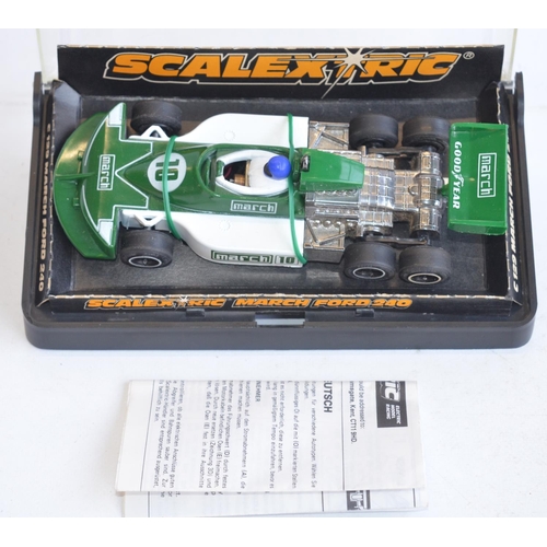 227 - Eight vintage slot racing cars to include Scalextric C129 Green March Ford 240, C426 F1 Williams, (w... 