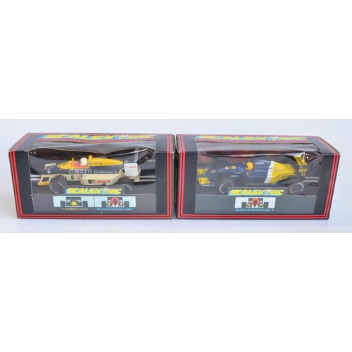 227 - Eight vintage slot racing cars to include Scalextric C129 Green March Ford 240, C426 F1 Williams, (w... 