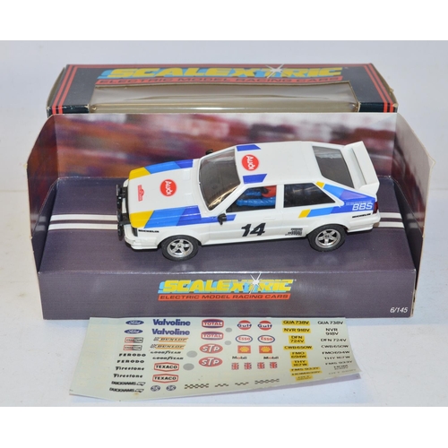 233 - Twelve vintage Scalextric slot cars to include C398 Red Mini (model mint), C399 Blue Mini (model min... 