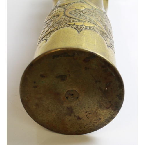 569 - Large Trench Art shell case with floral design. Dated 1910, H50cm