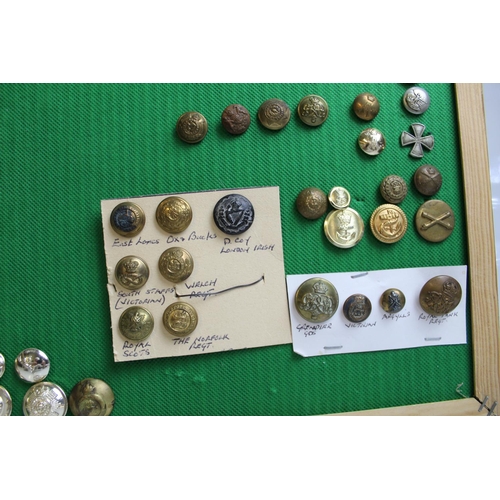 574 - Large framed collection of military buttons. A.R.P. R.N. Yorkshire Reg'. Ox and Bucks, etc. Framed c... 