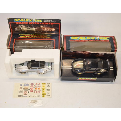 235 - Seven vintage Scalextric slot car models to include C288 Silver Porsche With Lights (excellent littl... 