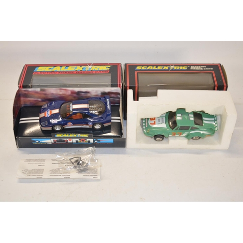 235 - Seven vintage Scalextric slot car models to include C288 Silver Porsche With Lights (excellent littl... 