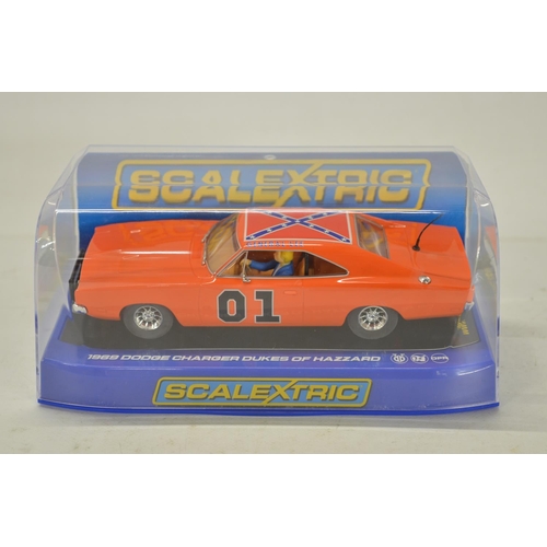 237 - Scalextric C3044 Dukes Of Hazzard 1969 Dodge Charger in as new unused condition with spare braid set... 