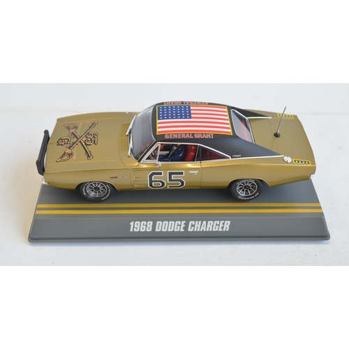 239 - Four 1/32 scale Dodge Charger slot car models from Pioneer to include Dukes Of Hazzard P016 General ... 