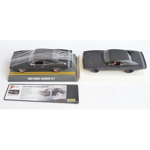 244 - Five 1/32 scale Street Muscle Dodge Charger slot car racing models from Pioneer to include limited e... 