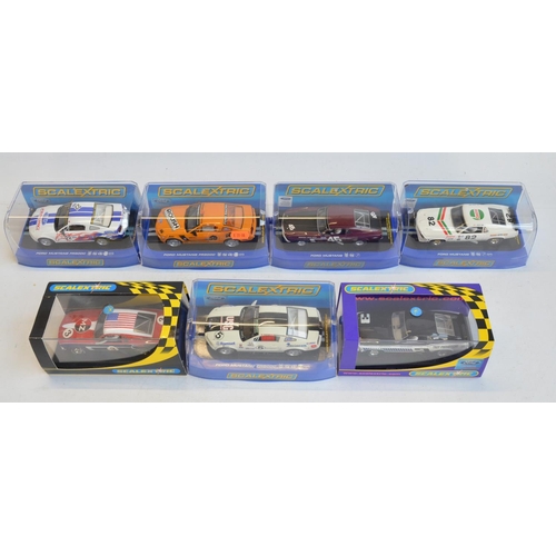 245 - Seven 1/32 scale Ford Mustang slot car racing models from Scalextric to include C2545 