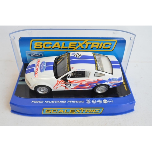 245 - Seven 1/32 scale Ford Mustang slot car racing models from Scalextric to include C2545 