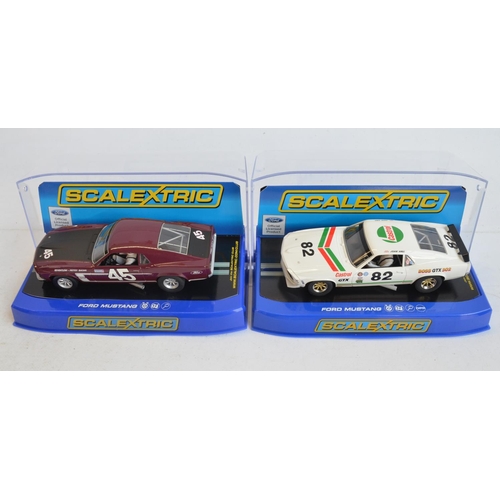 245 - Seven 1/32 scale Ford Mustang slot car racing models from Scalextric to include C2545 