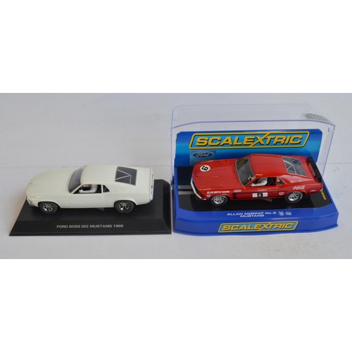 246 - Seven 1/32 scale Ford Mustang slot car racing models from Scalextric to include C2450 Plain White '6... 