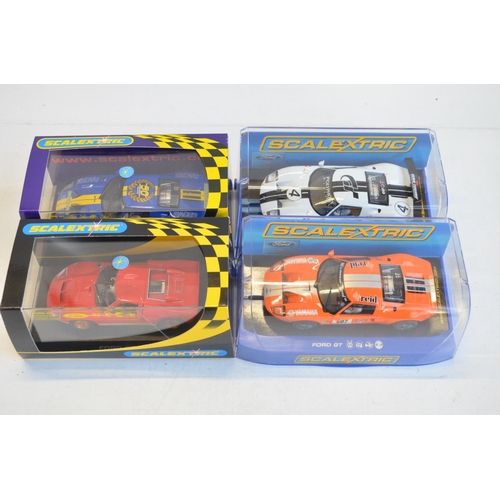 251 - Four Scalextric 1/32 scale Ford GT40 slot car racing models to include C2424 MkII Collectors Club 20... 