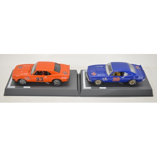 253 - Seven 1/32 scale Chevy Camaro slot car racing models from Pioneer and Scalextric to include Pioneer ... 