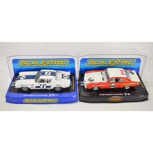 253 - Seven 1/32 scale Chevy Camaro slot car racing models from Pioneer and Scalextric to include Pioneer ... 