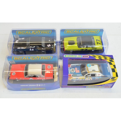 261 - Four 1/32 scale racing slot car models from Scalextric to include C2655 Ford Gran Torino LM 1976 No9... 