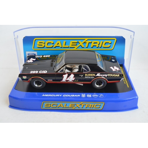 261 - Four 1/32 scale racing slot car models from Scalextric to include C2655 Ford Gran Torino LM 1976 No9... 