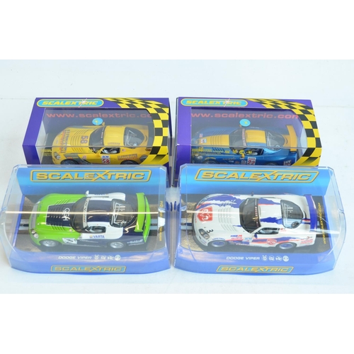 262 - Four 1/32 scale Competition Coupe Dodge Viper racing slot car models from Scalextric to include C290... 