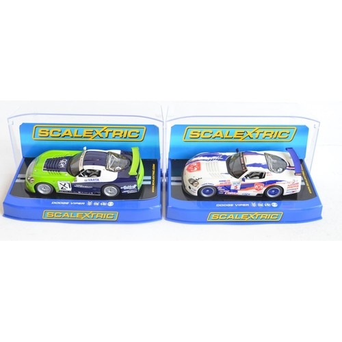 262 - Four 1/32 scale Competition Coupe Dodge Viper racing slot car models from Scalextric to include C290... 