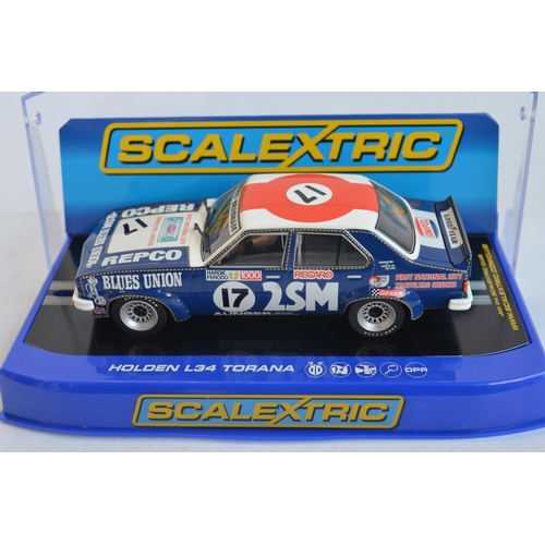 263 - Six 1/32 scale racing slot car models from Scalextric to include C2152 Premier Edition Chelsea FC Fe... 