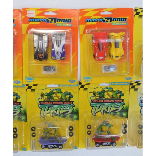 269 - Twelve Micro Scalextric racing slot car models to include 4x 1/64 scale Micro Mania and 8x Teenage M... 