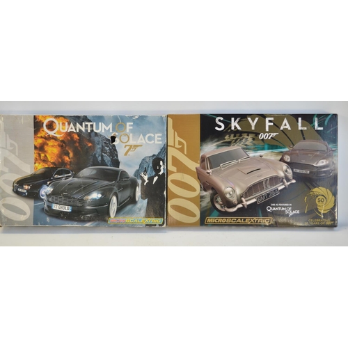 273 - Two Micro Scalextric 1/64 scale James Bond racing slot car sets to include Skyfall (unused/factory s... 