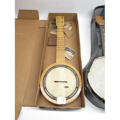 442 - The Merry Bright Reg. No. 422405 Banjo in case (a/f) and 2 other unnamed Banjo's (a/f) (3)