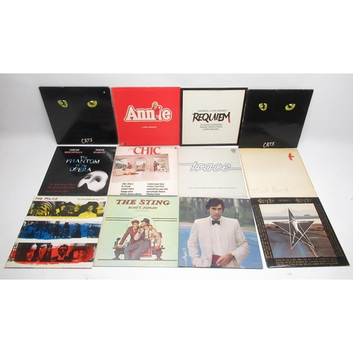 454 - Crosley Cruiser 3-speed portable turntable and a large collection of LPs inc. Bryan Ferry, The Polic... 