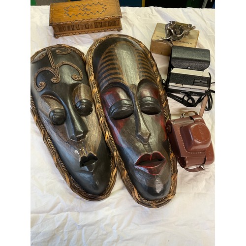 205 - C20th pair of carved African carved and painted tribal masks, mid C20th continental musical jeweller... 